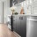 a kitchen with black cabinets