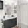 a bathroom with a white shower curtain