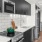 a kitchen with black cabinets